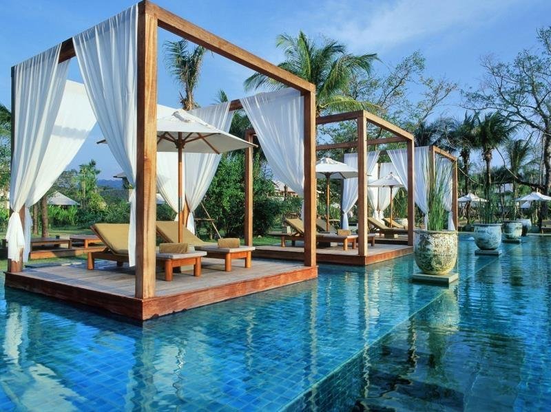 Poolside cabanas at The Sarojin